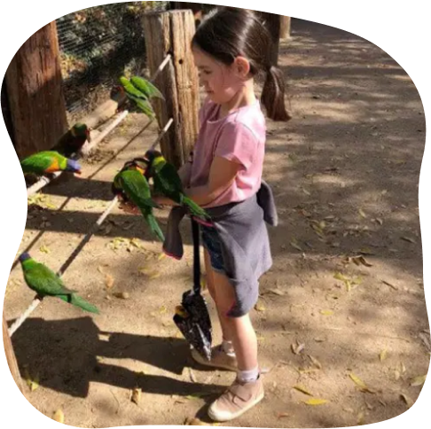 Girl with Parrots
